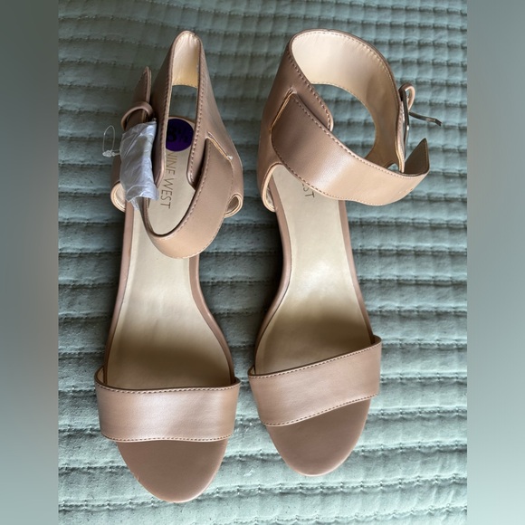 New, Nine West cream color wedges. There is 1 small indent on right shoe. - Picture 2 of 5